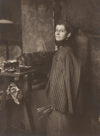 Olga Boznańska przy sztaludze w swojej paryskiej pracowni przy boulevard Montparnasse 49, Henri Manuel